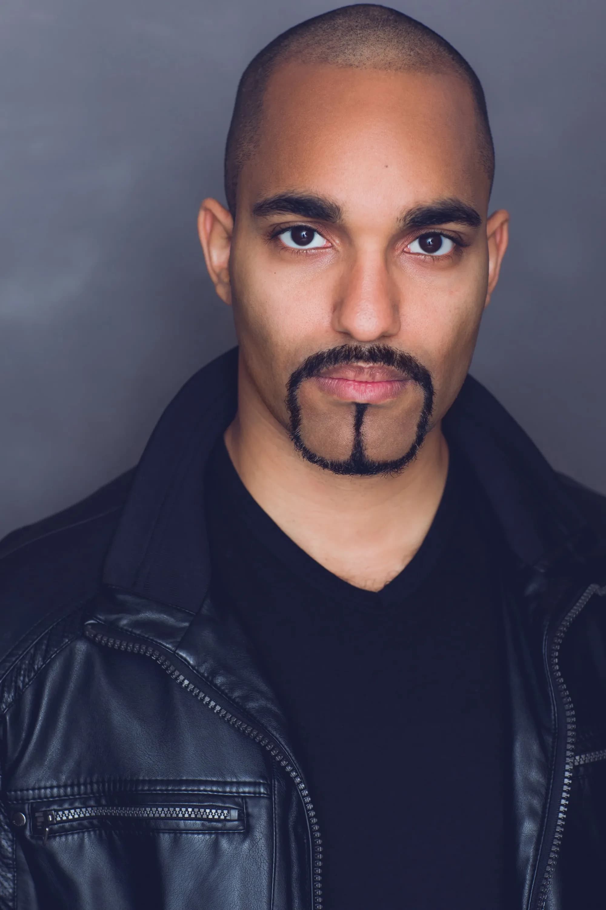 Amilcar Javier, tough headshot as a high-level gangster